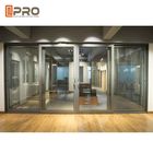 El polvo del diseño moderno cubrió las puertas deslizantes de aluminio para las puertas de cristal de desplazamiento automáticas comerciales opcionales del color de la oficina